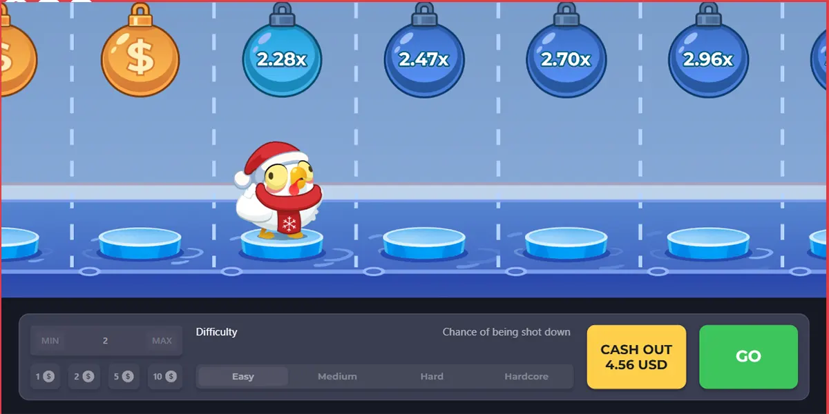 Screenshot of a winter-themed Chicken Road-style game showing a small chicken in a Santa hat standing on icy platforms beneath hanging multiplier bombs (2.28x, 2.47x, 2.70x, 2.96x), with a bottom control bar for bet and difficulty settings plus โCASH OUT 4.56 USDโ and a green โGOโ button.